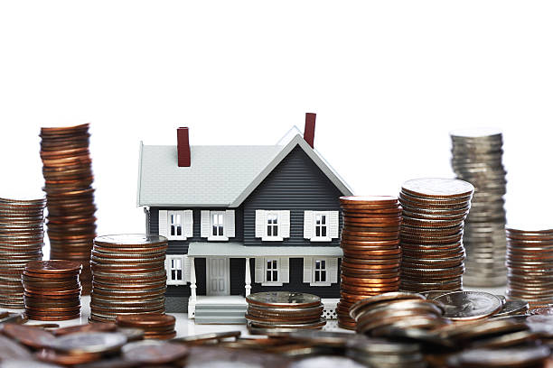 House And Stacked Coins